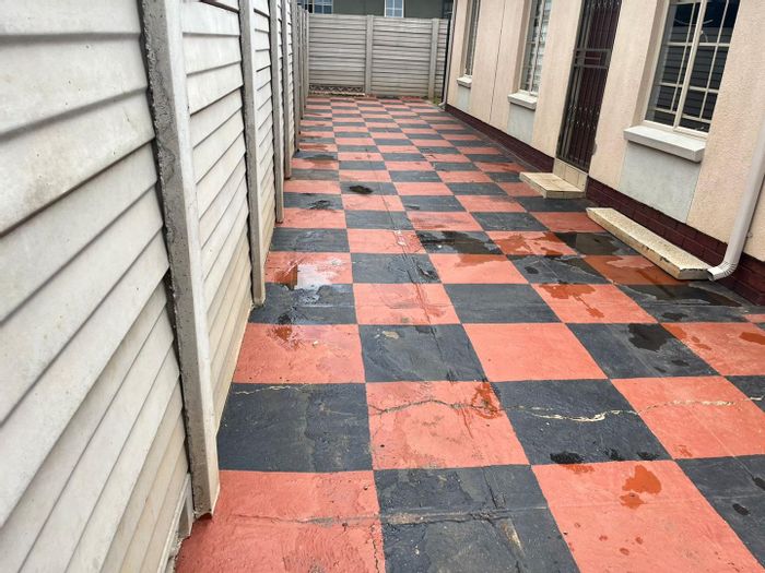 3-Bedroom House To Rent in Sky City with secure parking and solar geysers.