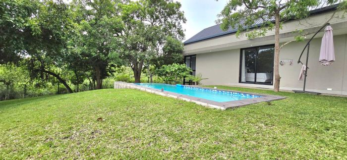 For Sale: Family House in The Rest Nature Estate with pool, patio, and garages.