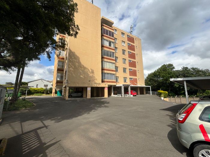 2 Bedroom Apartment To Rent in Queensburgh Central with communal braai and play area.