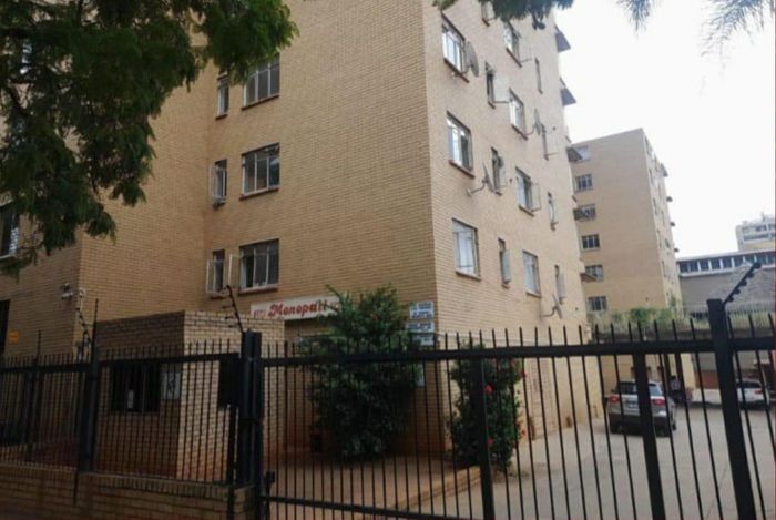 For Sale: Apartment in Pretoria Central with 2 bedrooms, garage, and versatile half-bedroom.