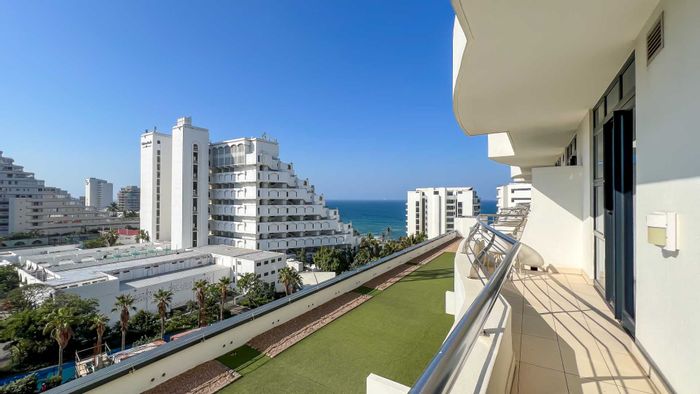 Umhlanga Rocks Central Apartment To Rent: Sea views, secure parking, pool, and amenities.