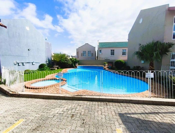 For Sale: New Redruth Townhouse with Private Garden, Pool, and Pet-Friendly Amenities.