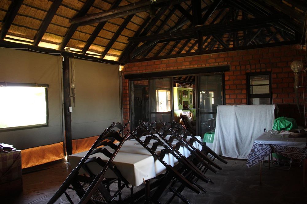 Outdoor/ enclosed entertainment room with indoor BBQ