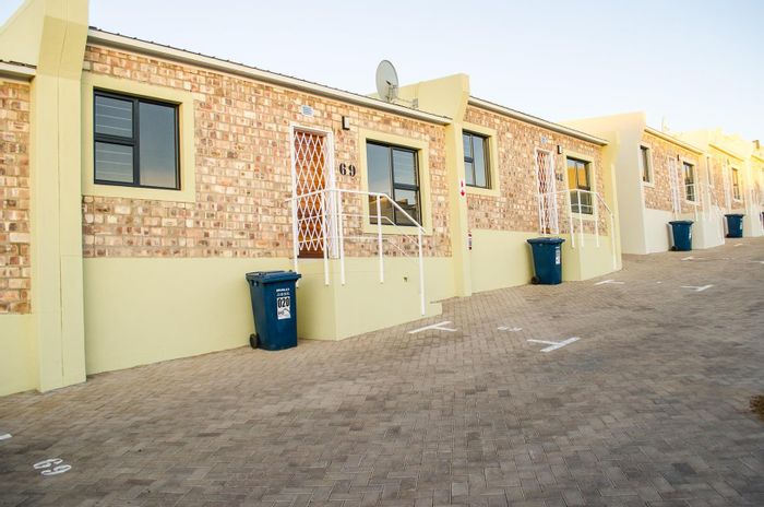 Charming 2-Bedroom Apartment for Sale in Otjomuise Ext 4 with Courtyard & Security!