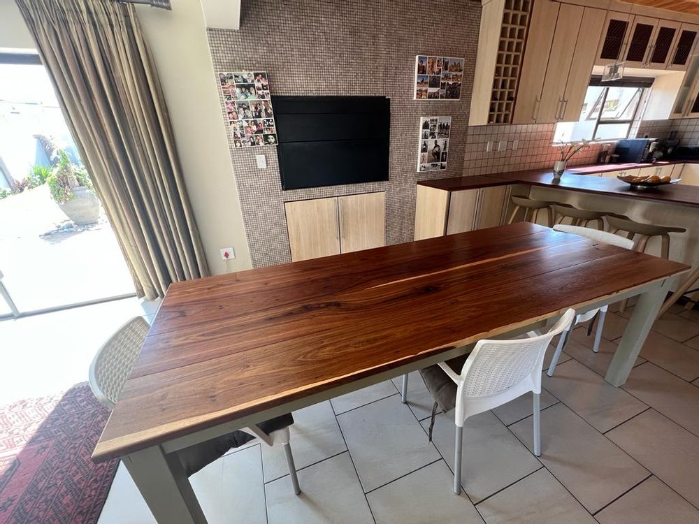 Dining room with indoor BBQ and open-plan kitchen