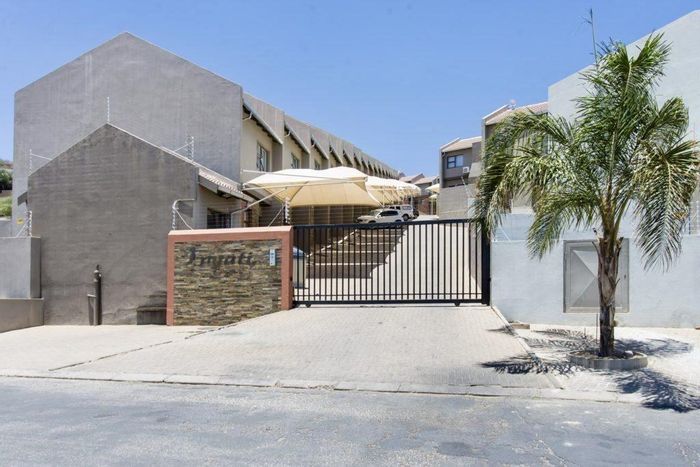 2-Bedroom Townhouse for Sale in Kleine Kuppe with Courtyard and Secure Parking.
