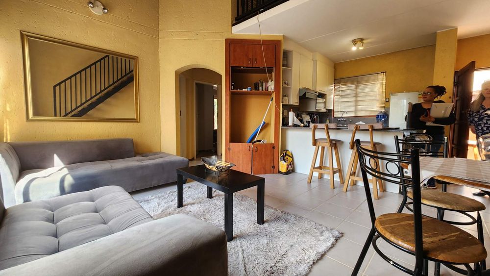 View of the lounge from bottom of the stair case.