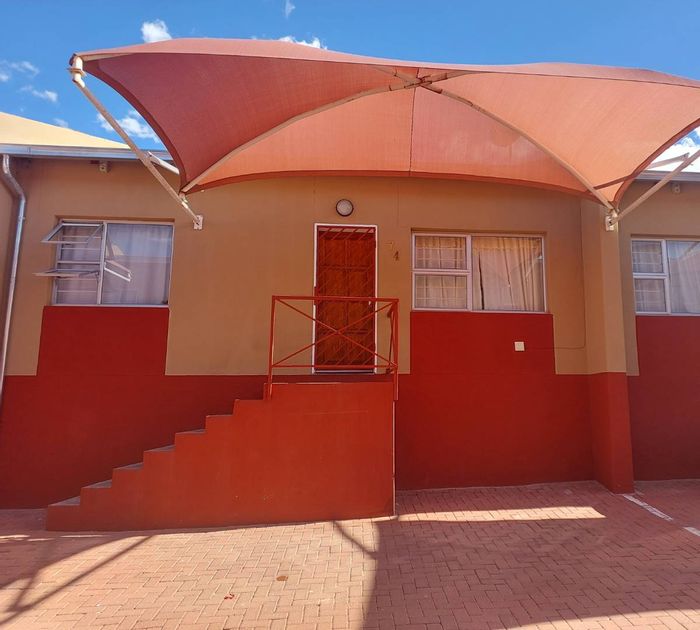 Modern 2BR Townhouse in Khomasdal with Renovated Kitchen, Alarm, and Covered Parking