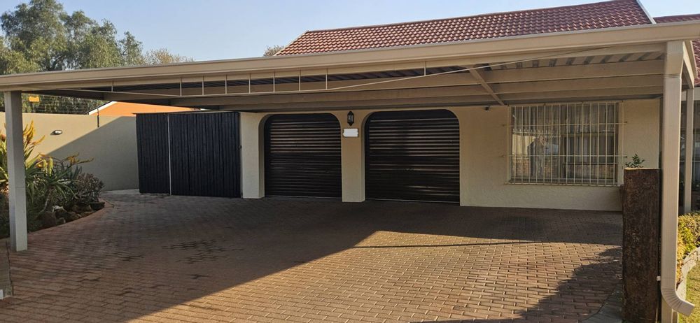 double garage with direct entry to house
large workshop attached to garage