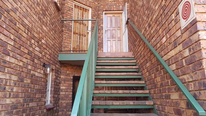 2-Bedroom Apartment To Rent in Centurion Central with private garden and pool access.
