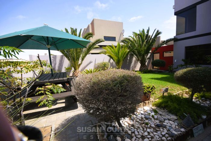 Ocean View House For Sale: Spacious with outdoor BBQ, rooftop patio, and 4 garages.