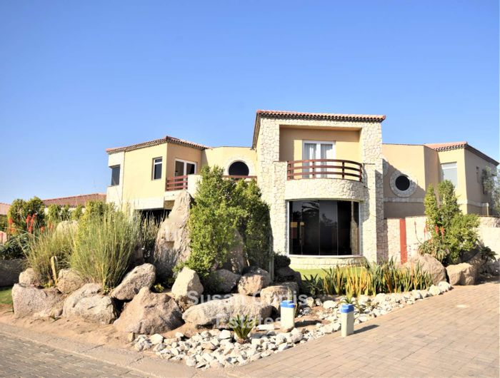 For Sale: House at Rossmund Golf Resort with pool, gym, and multiple garages.