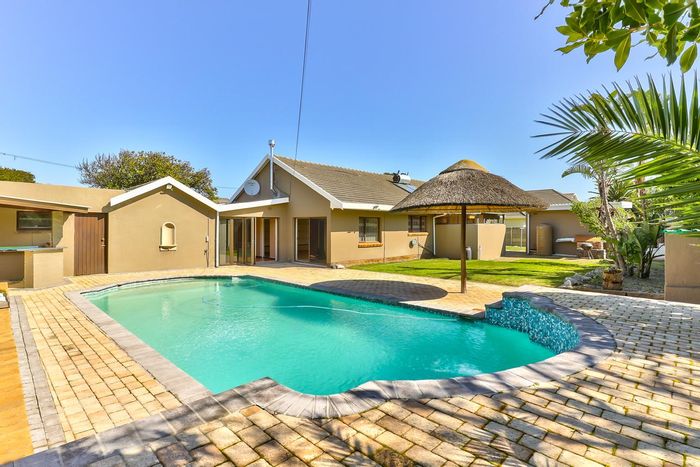 Milnerton Central House For Sale: Pool, braai area, security cameras, and maid's quarters.