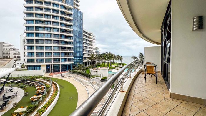 Beachfront apartment in Umhlanga Rocks Central for sale, featuring sea views and amenities.
