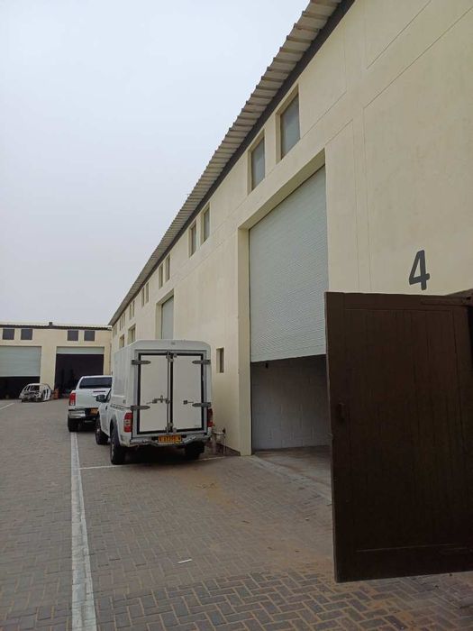 Spacious Industrial Warehouse with Roller Shutter Doors for Sale