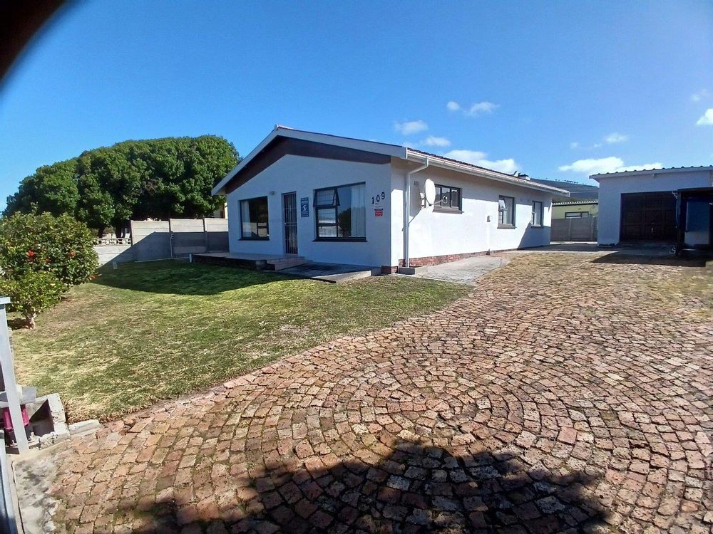 Again our Dwelling - with the Garage on our right. LOTS of parking space; 6 M/Vehicles. Facilitated by Patio - with low maintenance.