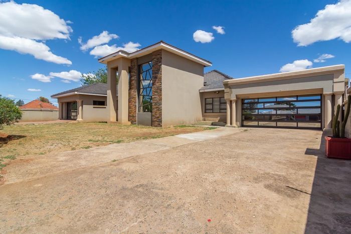 For Sale: Spacious 4-Bedroom House with Flatlets in Westonaria Central.