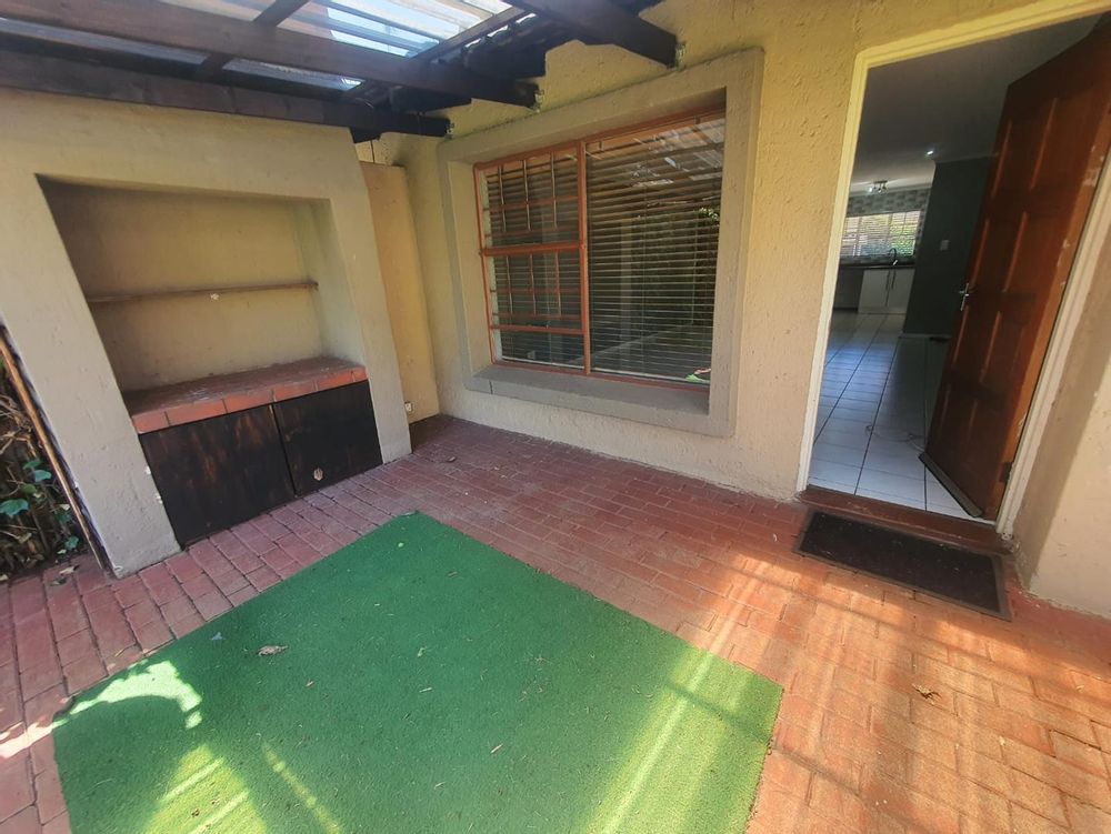 Undercover patio off the lounge with personal braai area