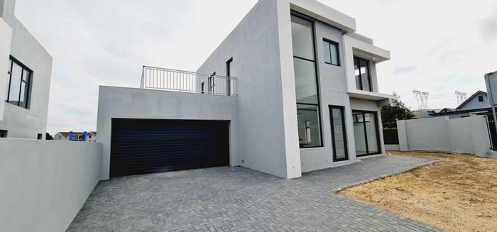 For Sale: House in Milnerton Central with gourmet kitchen, braai area, and secure parking.