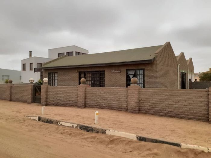 For Sale: Henties Bay Central House with 2 Bedrooms, Double Garage, Expandable Space.