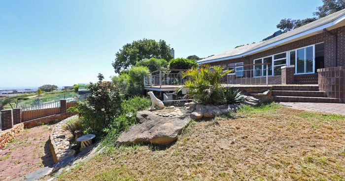 For Sale: Plattekloof House with dual homes, pool, garden, and parking options.