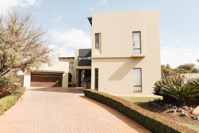 For Sale: House in Serengeti Estate with pool, garden, and advanced technology features.