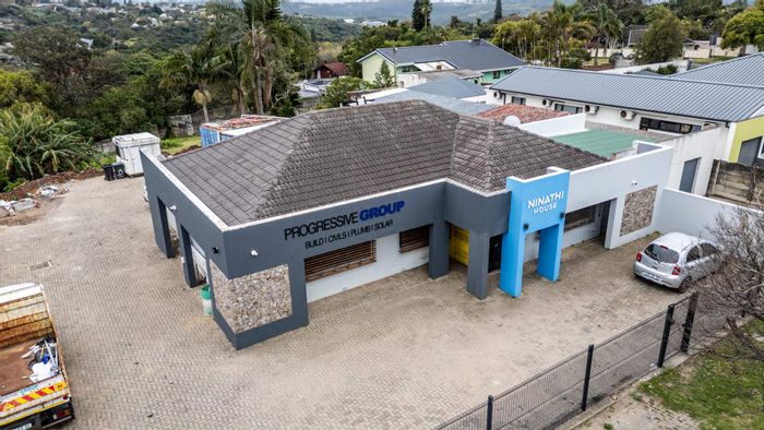 Versatile business property in Beacon Bay with ample office space and development potential. For Sale.
