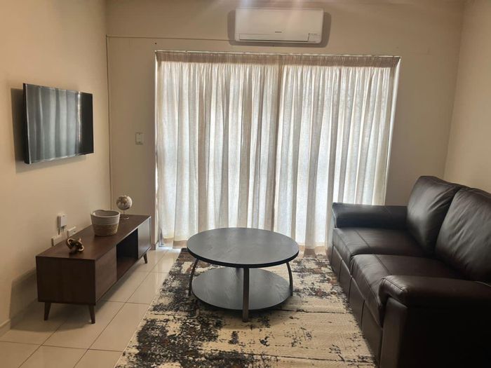 Fully furnished 1-bedroom apartment in Windhoek Central, 24/7 security, basement parking.