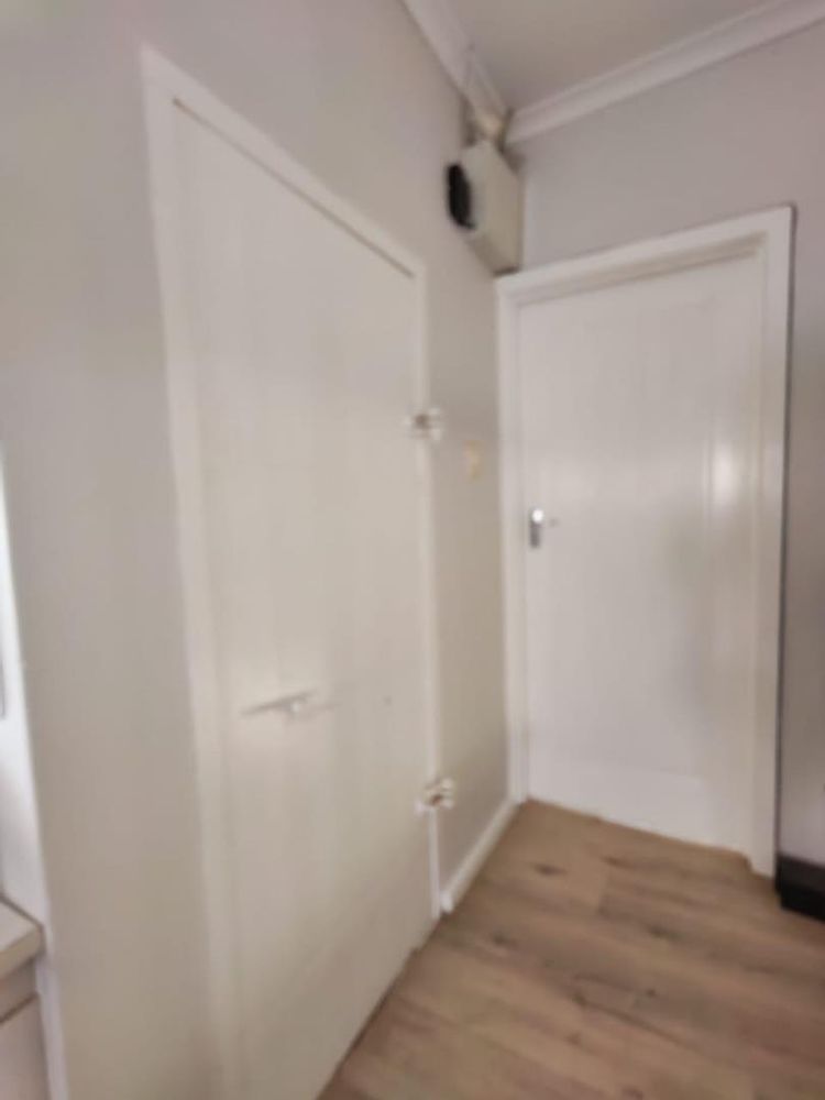 walk in safe next to office / workspace area and entrance to third bedroom 