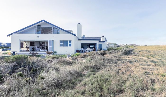 Grotto Bay Central House For Sale: 4 beds, sea views, solar power, indoor braai.