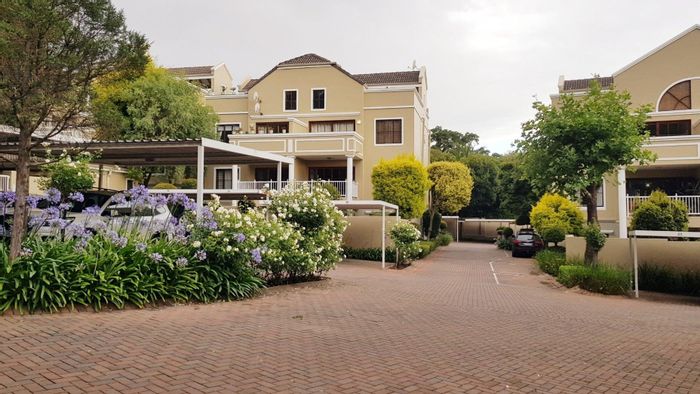 Saxonwold Apartment For Sale: Spacious unit with garden, pool, and parking amenities.