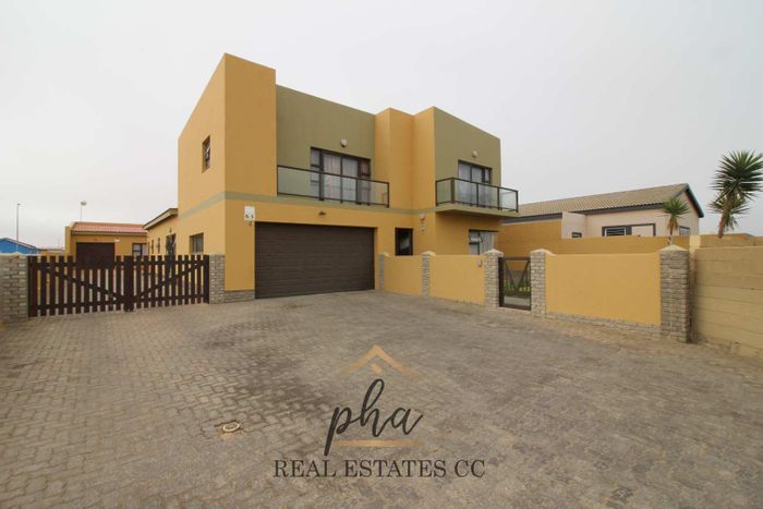 House for Sale in Swakopmund Ext 9: Includes granny flat, separate flat, spacious yard.