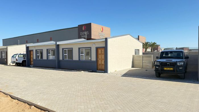For Sale: Townhouse in Walvis Bay Central with 2 beds, courtyard, and garage.