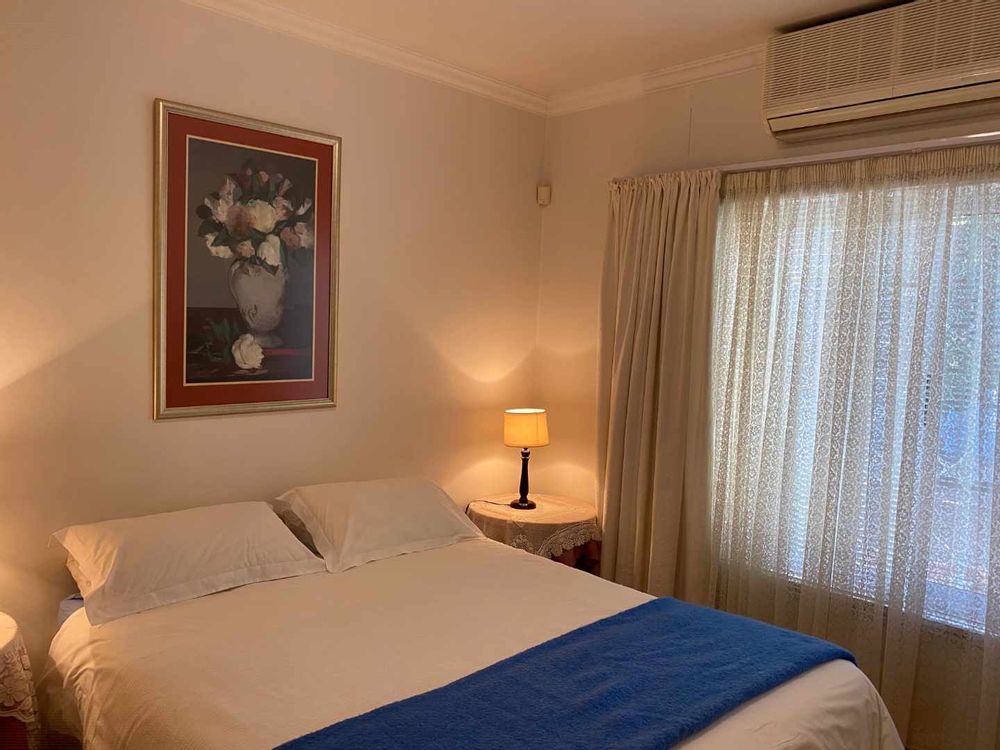 All bedrooms, in fact all rooms other than the bathrooms and the garage, is fitted with air-conditioning.