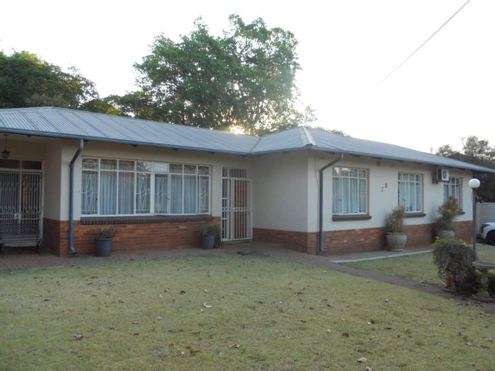 3 Bedroom House To Rent in Groenkloof with garden, borehole, and security features.