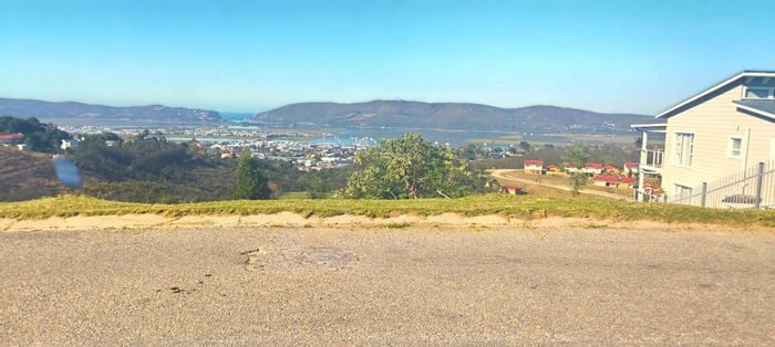Elevated 918sqm vacant land in Knysna Heights with lagoon views, for sale.