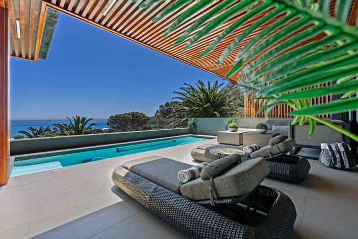 Camps Bay House For Sale: 4 bedrooms, pool, gym, guest suite, panoramic views.