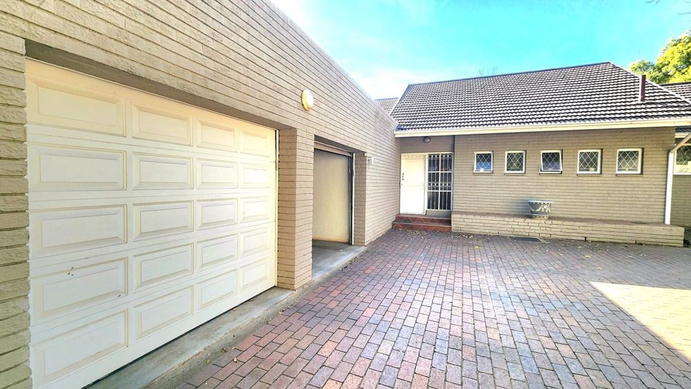 Front door and large double garage