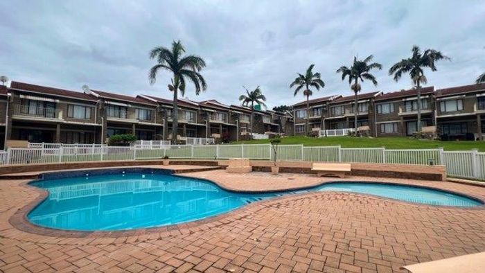 Uvongo Townhouse for Sale: Spacious Duplex Steps from Beach with Pool Access!