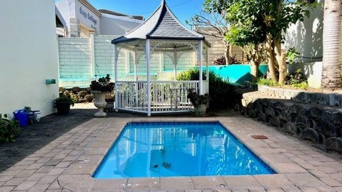 Manaba Beach Townhouse for Sale: Pool, Garden Views, Walk to Shops!