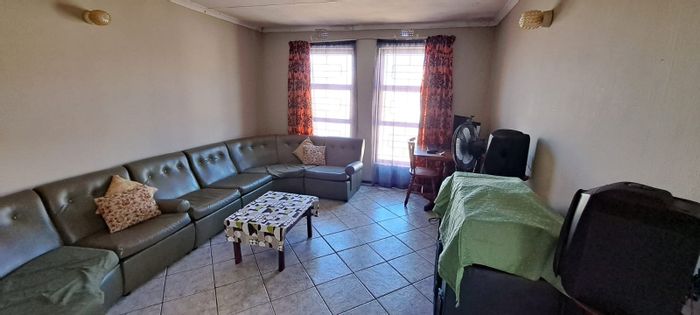 Charming 3-Bedroom House with Garage, Spacious Yard in Strandfontein Village - For Sale