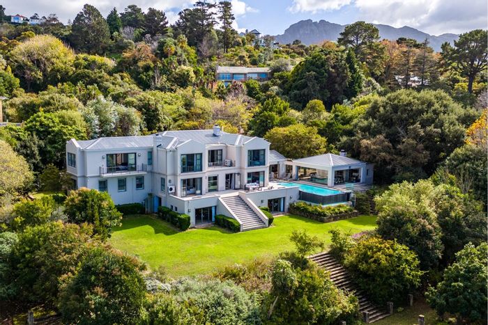 For Sale: House in Constantia with vineyard, pool, and entertainment areas.