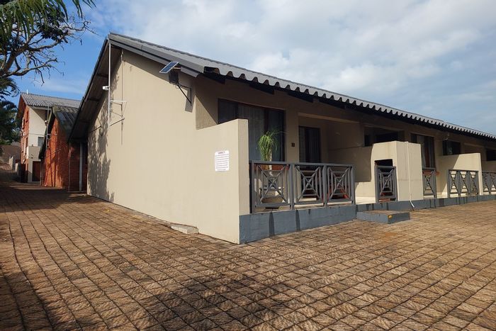 For Sale: Apartment in St Lucia Central with pool, braai area, and rental potential.