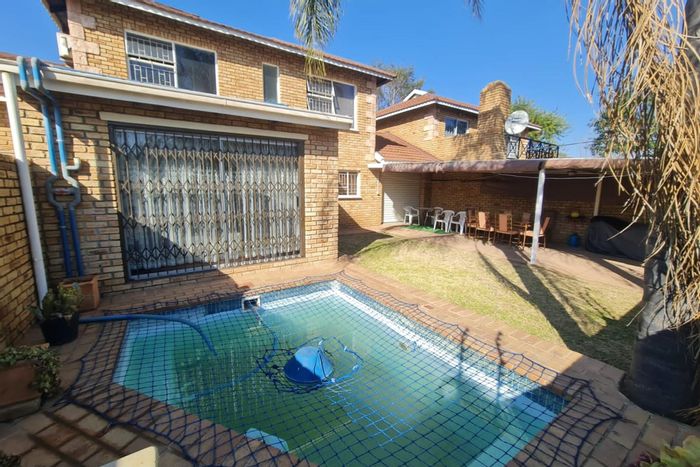 For Sale: Townhouse in Wilgeheuwel with pool, garden, and open-plan living.