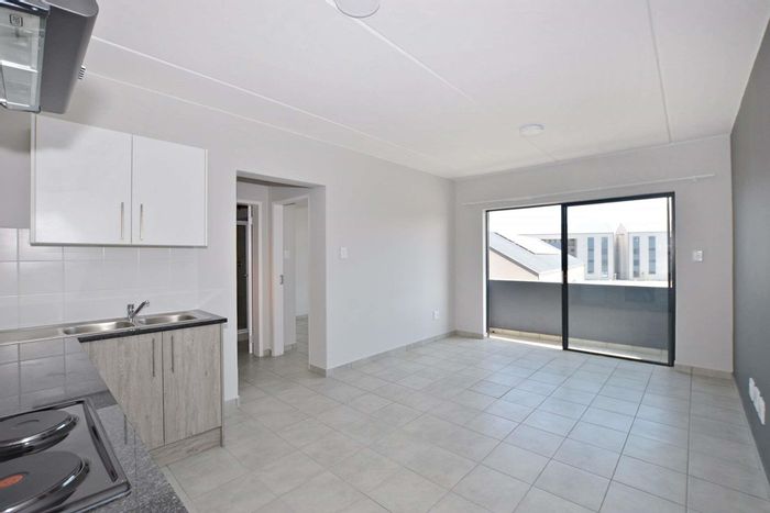 For Sale: Apartment in Parklands North with balcony, security, and investment potential.