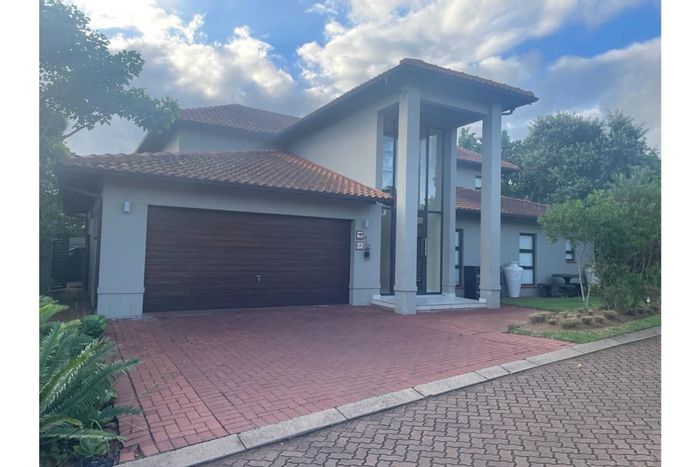 4-Bedroom House To Rent in Port Zimbali Estate with pool and entertainment areas.