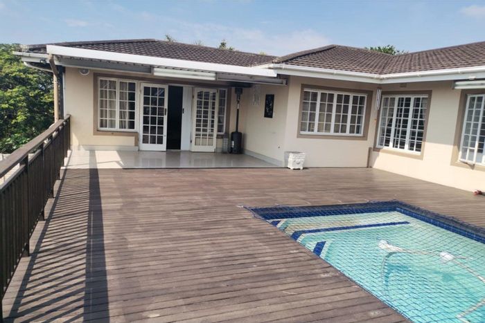 Four-bedroom house with pool, deck, and flatlet for sale in Sunningdale.