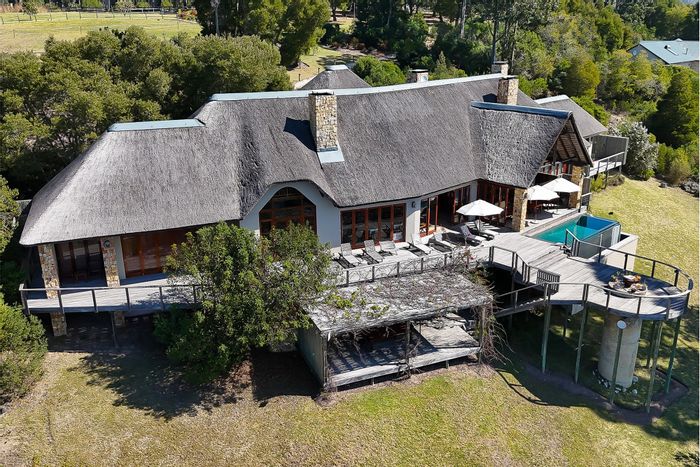 Keurbooms Farm For Sale: Equestrian estate with lodge, stables, and nature reserve access.