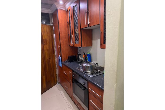 Two-bedroom house to rent in Soshanguve Ext with fitted kitchen and carport.