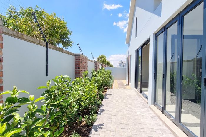 For Sale: House in Graanendal with open-plan living, double garage, and braai patio.